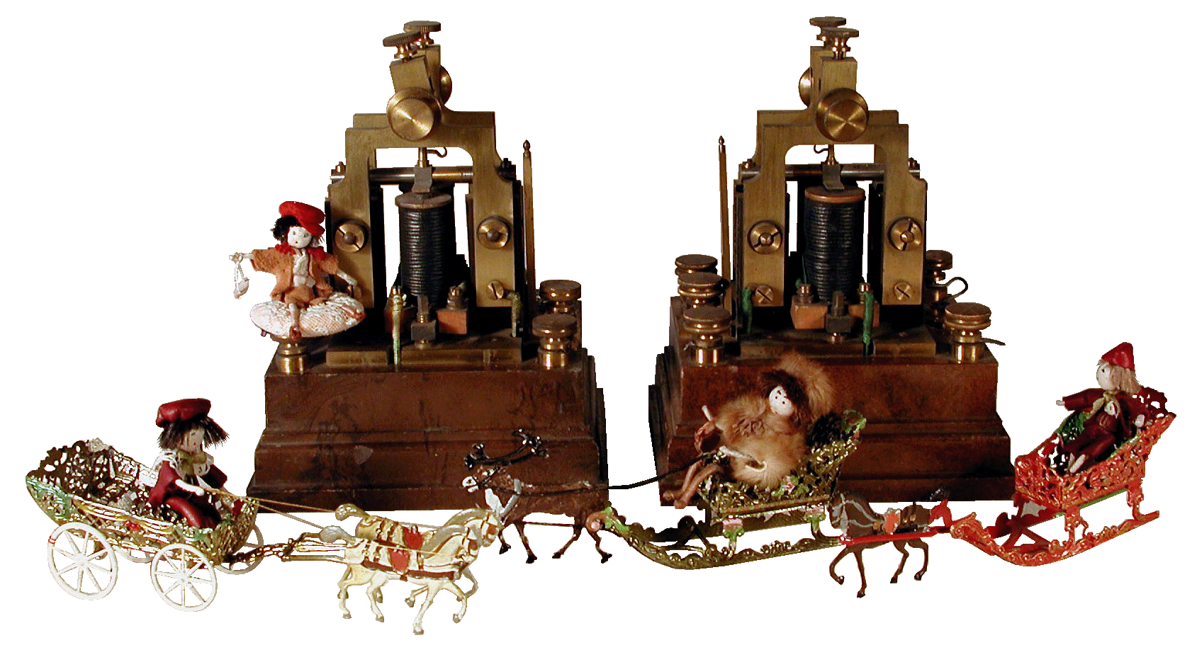 Les petites poupées avec des "alternateurs" de laboratoire du XIX ème. siècle, en cuivre et bakélite.