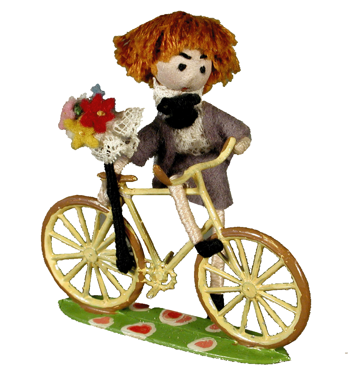Valentin, (N°49), sur un vélo en étain de "CBG", haut. 53 mm.Tête en peau, cheveux en coton.